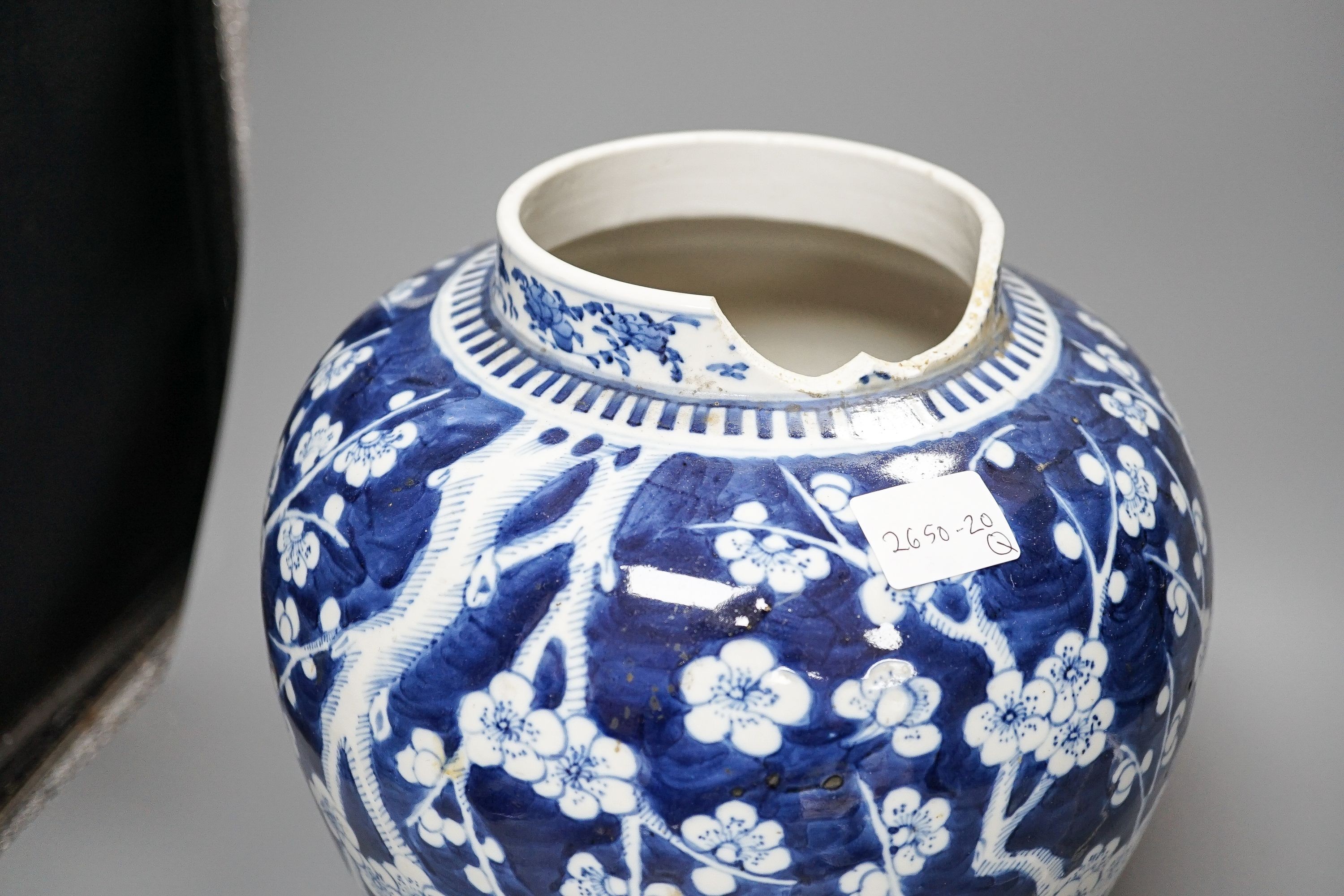A 19th century Chinese blue and white Prunus jar and cover, 36cm and a group of 18th century Chinese export famille rose tea bowls and a plate